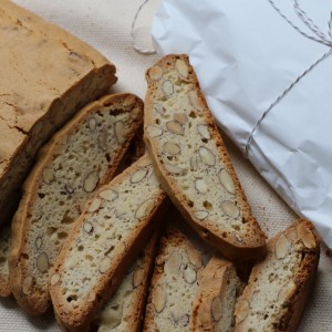 Laura's own-recipe Italian biscotti is sold at markets in pretty packets of 5.  It can also be ordered by the whole "loaf", ready-baked and reassembled for an impressive gift; or baked only once for you to cut and bake when you want to.  

[Food made and photographed by Laura Donohue, Cottage Garden Cookery]