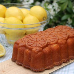 Zesty and fine-crumbed lemon cake, made in Laura's favourite decorative tin, with lots of fresh-lemon drizzle. 

[Food made and photographed by Laura Donohue, Cottage Garden Cookery]